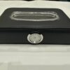 Premium black leather car tissue box holder with integrated analog clock on a dashboard layout Pakistan.