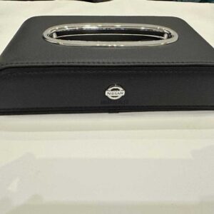 Premium black leather Nissan tissue box holder for car dashboard and interior styling Pakistan.